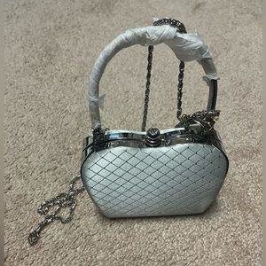 Silver fancy clutch or purse